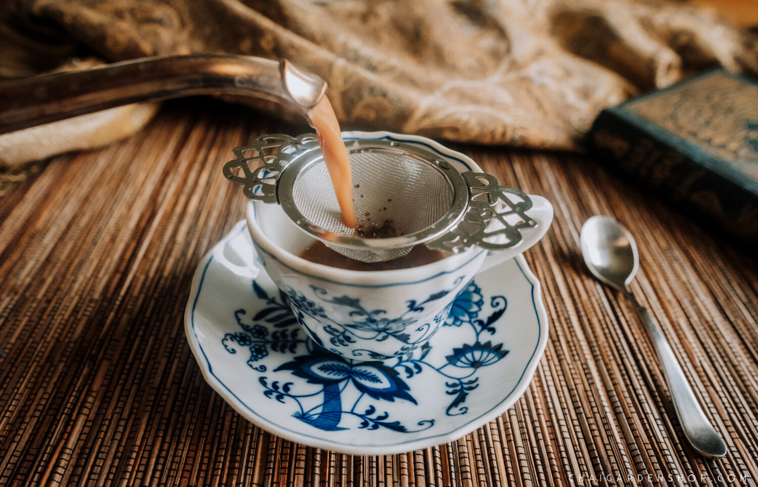 -tea-strainer-bowls,-elegant-tea-strainer, jane austen empress tea strainer, organic chai tea spokane wa